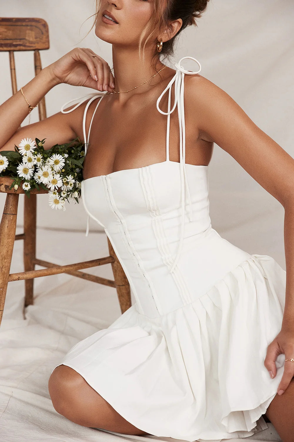 white pleated mini dress